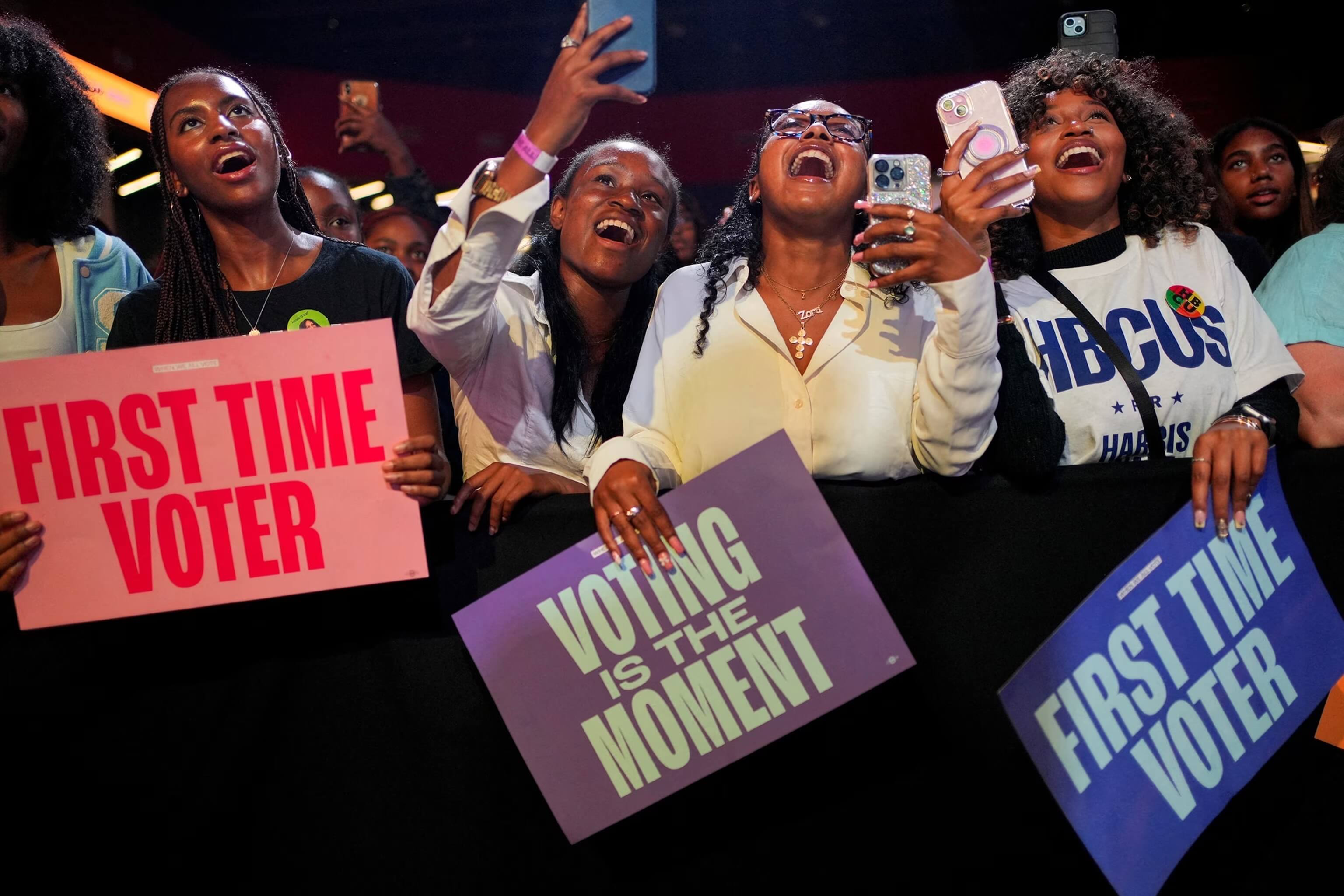 First-time voters cheering at a rally